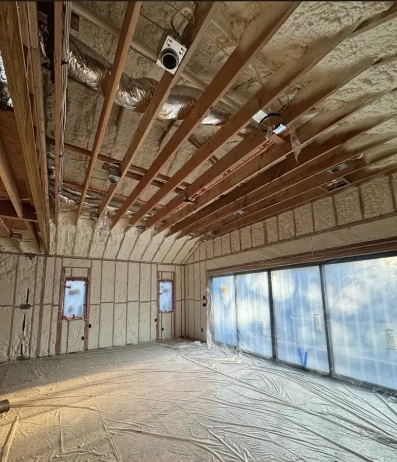 Interior walls and ceiling insulated with spray foam during new construction in Fairfax